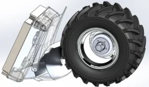 Illustration of a mechanical component with a large black rubber tire and a partially transparent casing, showing inner parts of the assembly.